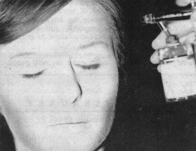 Chelsea's face being airbrushed for the State Press Magazine Article.