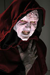 Mark Greenawalt applys prosthetics to self as Darth Sideous at LepreCon 33