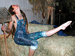 model phoebe in painted on denim bib overalls