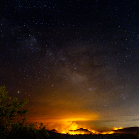 Fire in the Catalina Mountains near Tucson called the Big Horn fire plus the Milkey Way in the sky above.