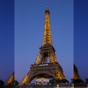The illuminated Eiffel Tower in Paris, France.