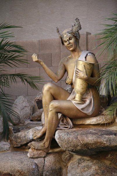 Dona Wood collects the coins and sings the reprise