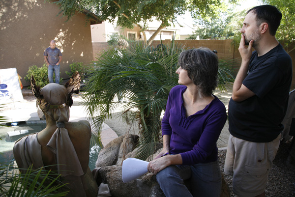 Diane Dresback and Bob Marquis pondering the shot behind Dona Wood