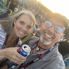 Talking Stick Resort Amphiteater lawn pass Lori and Mark drinking beer